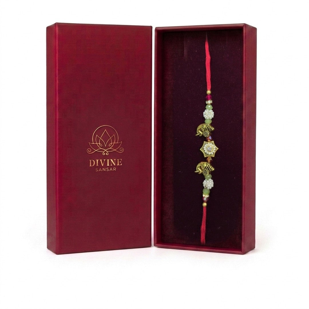 Gaja Sri gold elephant rakhi in Divine Sansar gift box