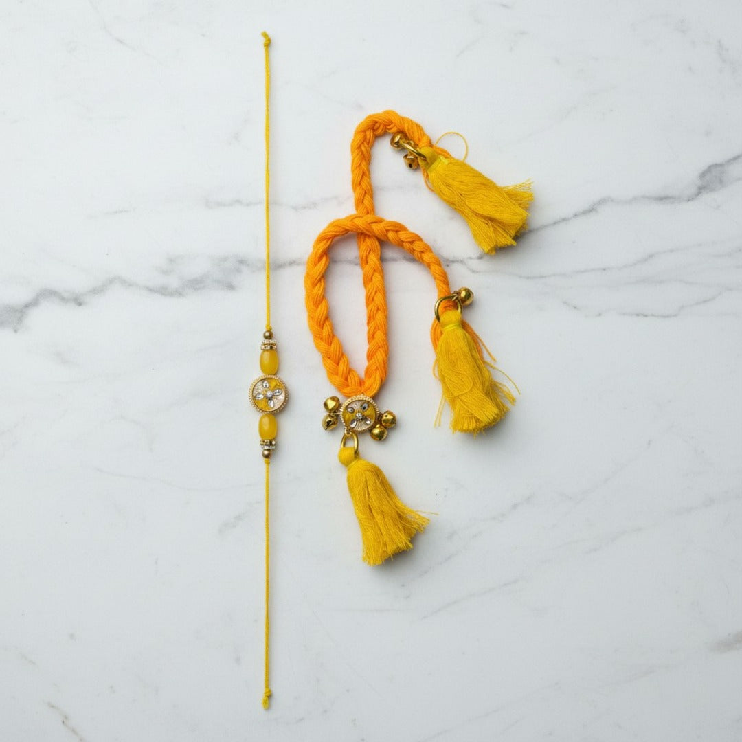 Golden kundan bhaiya bhabhi rakhi lumba set on marble - Divine Sansar