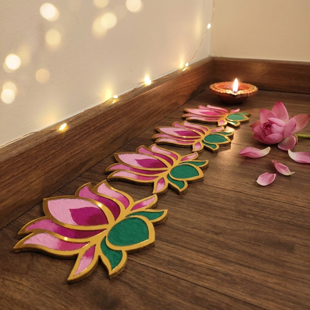 Set of 4 Kamal Lotus 4 inch golden rangoli pieces laid along the wall in a Dubai home for Diwali - Divine Sansar