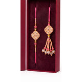 Pink diamond meenakari rakhi and lumba set close up Divine Sansar