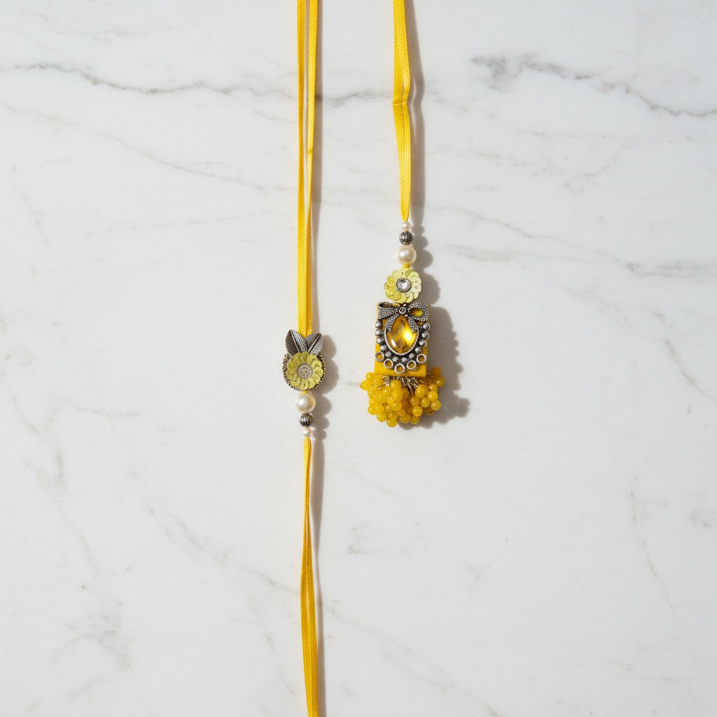 Haldi Chandi Jodi Yellow Oxidised Bhaiya Bhabhi Rakhi Set on marble - Divine Sansar UAE