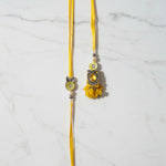 Haldi Chandi Jodi Yellow Oxidised Bhaiya Bhabhi Rakhi Set on marble - Divine Sansar UAE