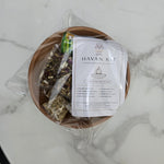 Havan kit packed inside its terracotta clay vedi with the havan vidhi card on top - Divine Sansar