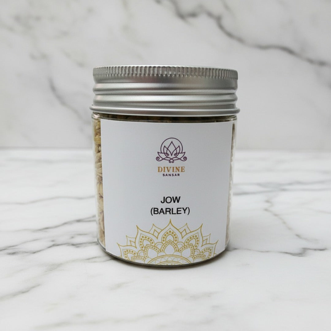 Jau (Jow) barley seeds for Navratri in a 90g jar on white marble - Divine Sansar