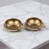 Brass Kuber Diya pair on white marble - Divine Sansar