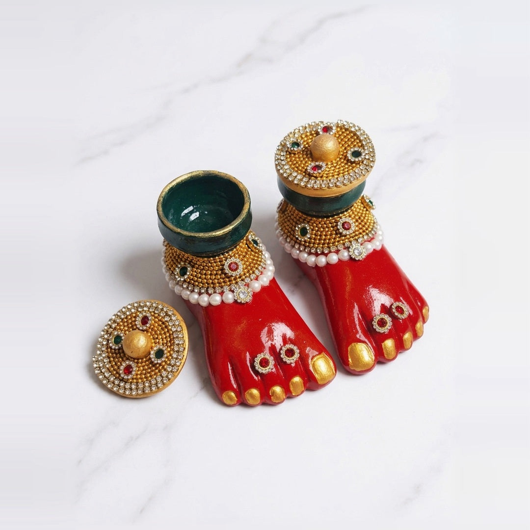 Laxmi Charan terracotta diya pair with one bowl open and one covered by its gold lid, Divine Sansar