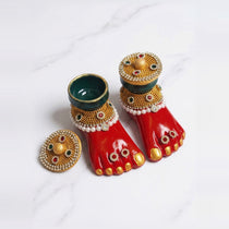 Laxmi Charan terracotta diya pair with one bowl open and one covered by its gold lid, Divine Sansar