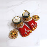 Laxmi Charan bowls holding kheel batasha and dirham coins for Lakshmi Pujan, Divine Sansar