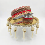 Majestic Glow red and gold Karwa Chauth thali set with gold brocade base, mirror-work rim, pearl tassels, embroidered chhalni and kalash - Divine Sansar UAE