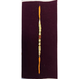 Pearl and red stone rakhi close up Divine Sansar