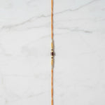 Mangal Moti Pearl and Red Stone Rakhi on marble - Divine Sansar UAE