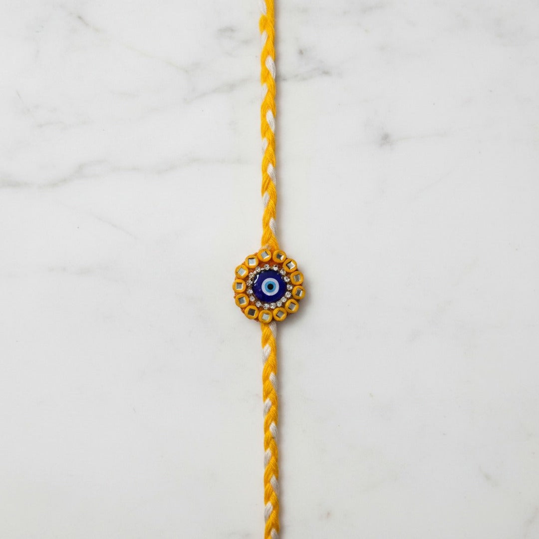 Evil eye mirror work nazar rakhi on marble - Divine Sansar