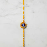 Evil eye mirror work nazar rakhi on marble - Divine Sansar