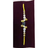 Pearl evil eye rakhi close up Divine Sansar