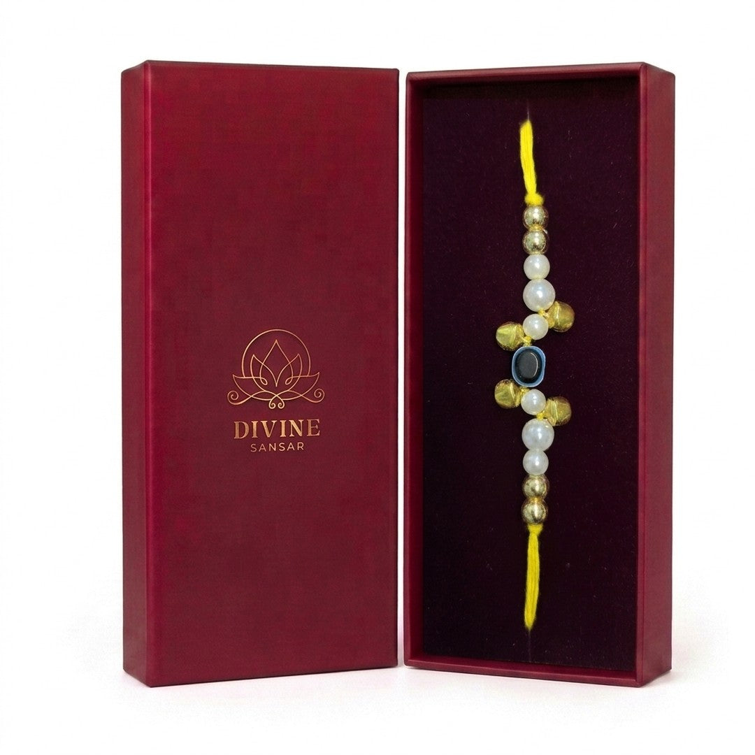 Moti Nazar pearl evil eye rakhi in Divine Sansar gift box