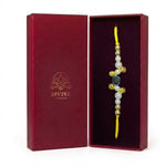 Moti Nazar pearl evil eye rakhi in Divine Sansar gift box