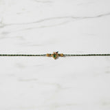 Nandalal Krishna Mor Pankh Om Rakhi on marble - Divine Sansar UAE