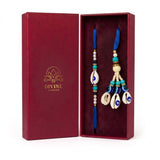 Nazar Kavach Neel blue evil eye kauri bhaiya bhabhi rakhi set in Divine Sansar gift box
