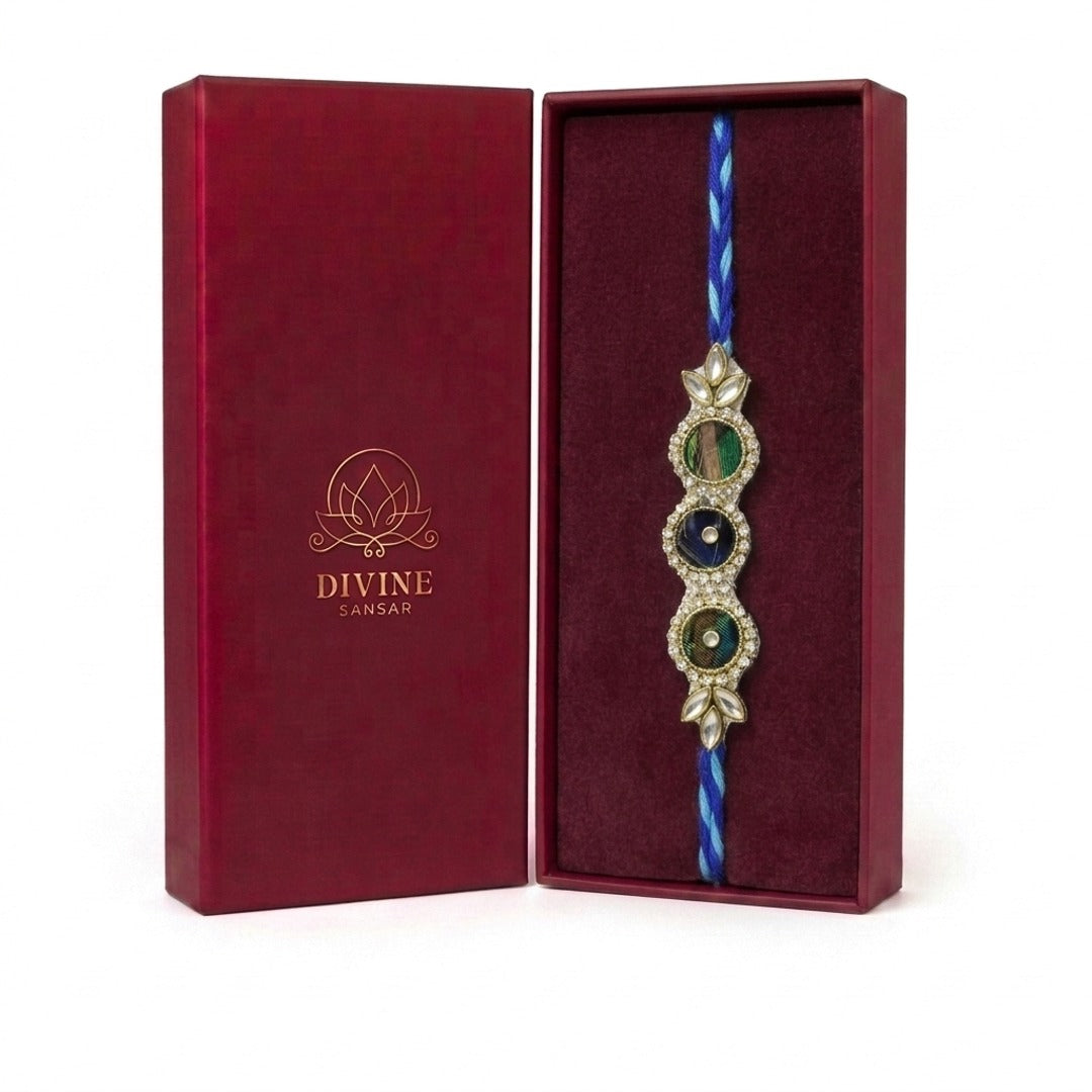 Peacock feather kundan rakhi in maroon gift box - Divine Sansar
