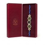Peacock feather kundan rakhi in maroon gift box - Divine Sansar