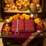 Bahi Khata on a Diwali pooja chowki with diya, marigold and kalash for Chopda Pujan - Divine Sansar