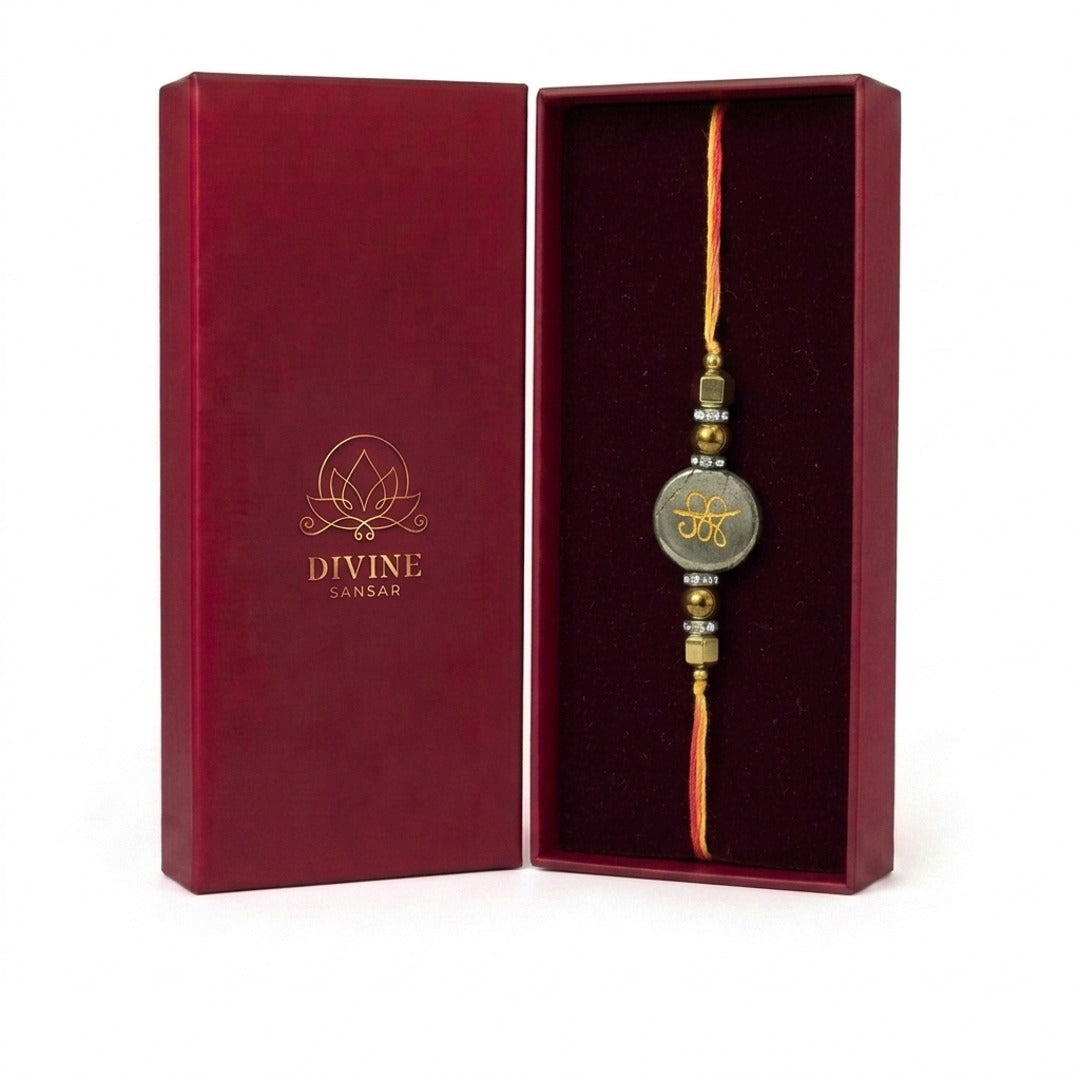 Pyrite rakhi Zibu abundance symbol side in maroon gift box - Divine Sansar