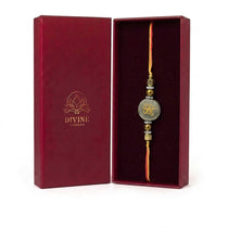 Pyrite rakhi Zibu abundance symbol side in maroon gift box - Divine Sansar