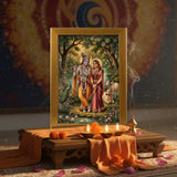 Radha Krishna gold acrylic photo frame on a home mandir pooja setup with diyas and flowers - Divine Sansar
