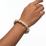 Radhe Tulsi Bracelet worn on the wrist, stretch fit tulsi wood beads - Divine Sansar
