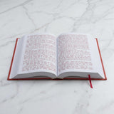 Open Ramayan book showing large red Hindi Devanagari text - Divine Sansar