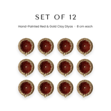 Set of 12 red and gold 8 cm clay diyas, agal vilakku for Diwali in UAE - Divine Sansar