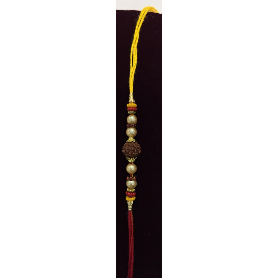 Rudraksha carved deity bead rakhi close up Divine Sansar
