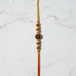 Rudra Kavach Rudraksha Rakhi on marble - Divine Sansar UAE