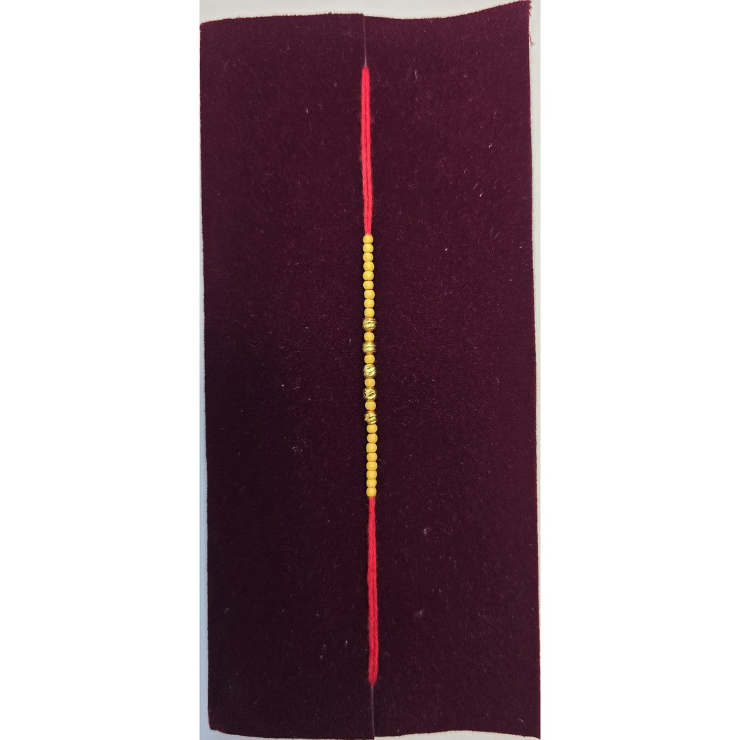 Simple mustard bead rakhi close up Divine Sansar