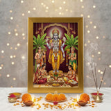 Satyanarayan gold acrylic photo frame on a home mandir pooja setup with diyas and flowers - Divine Sansar