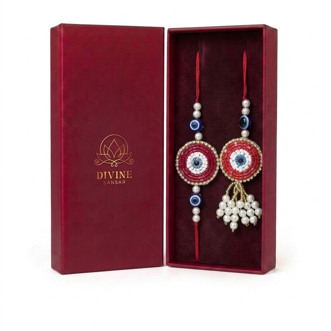 Red evil eye bhaiya bhabhi rakhi and lumba set in maroon gift box - Divine Sansar