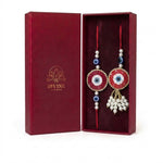 Red evil eye bhaiya bhabhi rakhi and lumba set in maroon gift box - Divine Sansar