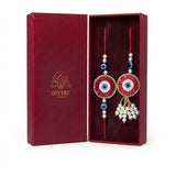 Red evil eye bhaiya bhabhi rakhi and lumba set in maroon gift box - Divine Sansar