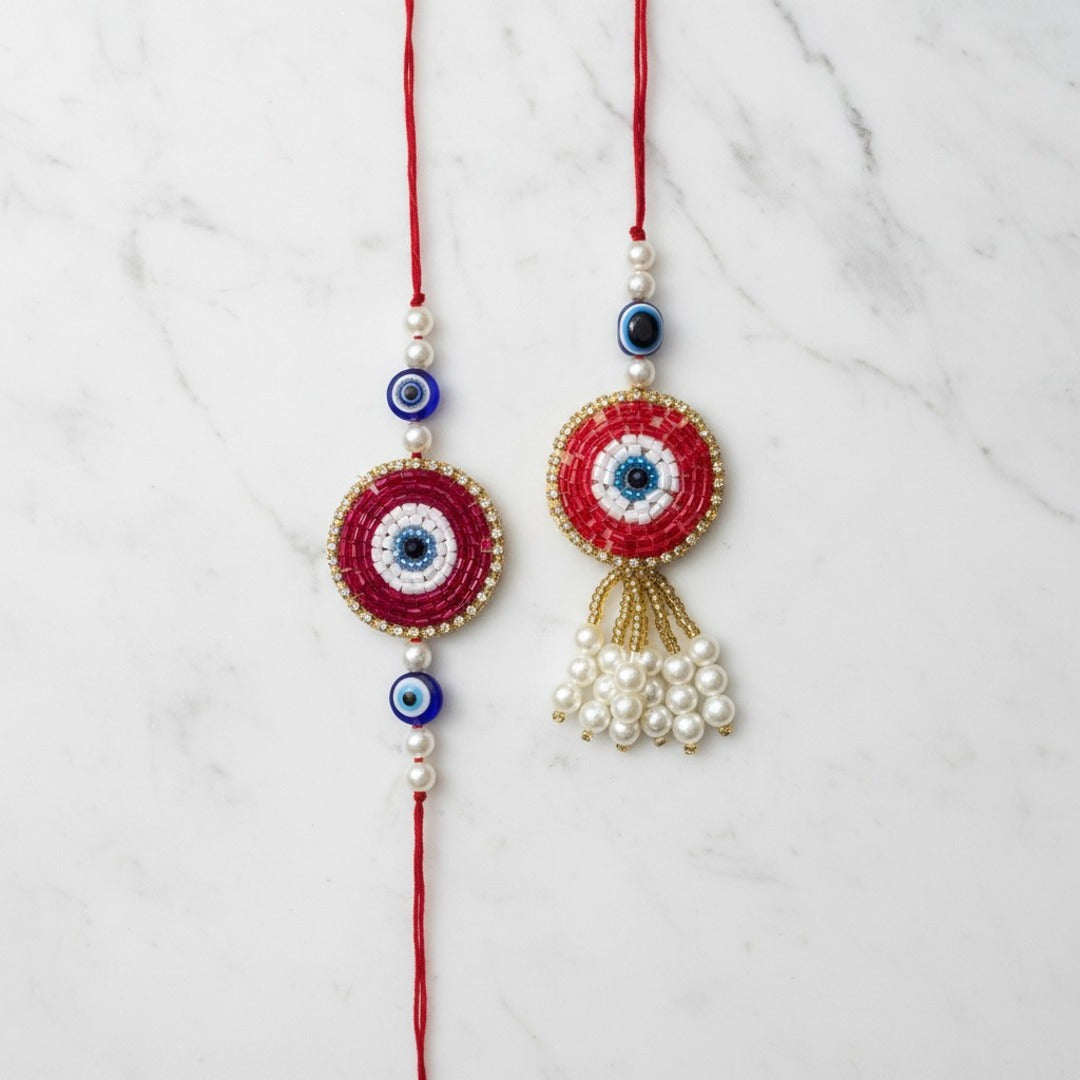 Red evil eye nazar rakhi lumba set on marble - Divine Sansar