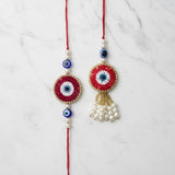 Red evil eye nazar rakhi lumba set on marble - Divine Sansar