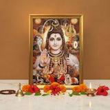 Shiv Parivar A4 wooden photo frame on a pooja setup with diya, bell, rudraksha mala and marigold - Divine Sansar