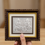 Silver Lakshmi Ganesh frame held in hand for size - Divine Sansar