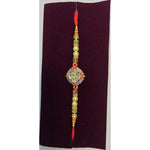 Diamond kundan rakhi with blue enamel close up Divine Sansar