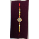 Diamond kundan rakhi with blue enamel close up Divine Sansar