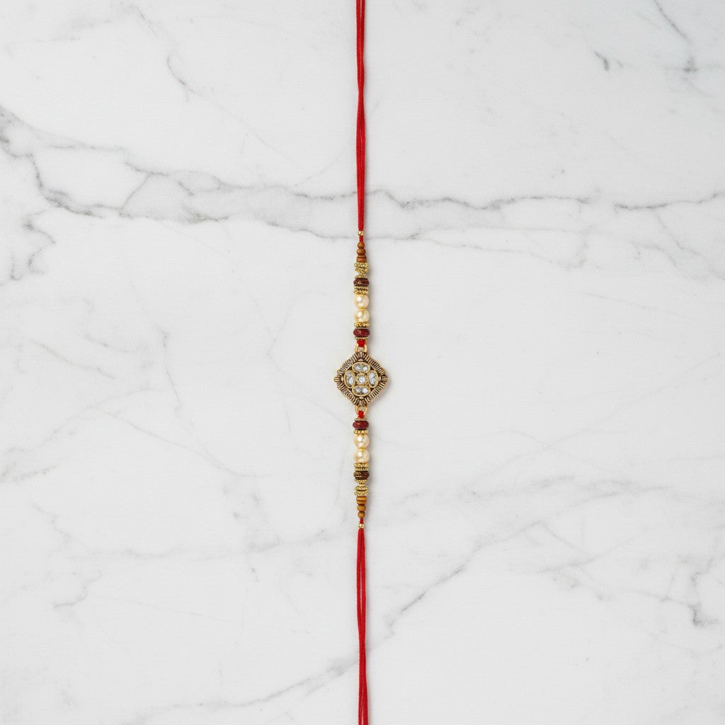 Suryamani Diamond Kundan Rakhi on marble - Divine Sansar UAE