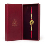 Swarna Mor gold peacock rakhi in Divine Sansar gift box