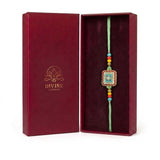 Vanasri green meenakari rakhi in Divine Sansar gift box
